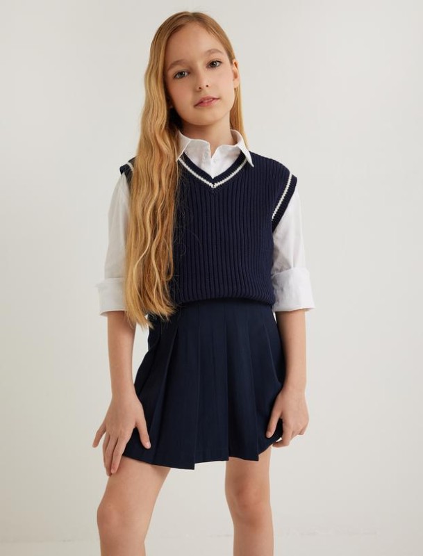 Теплый преппи: какие свитеры, жилеты и брюки выбрать ребенку в школу и не только