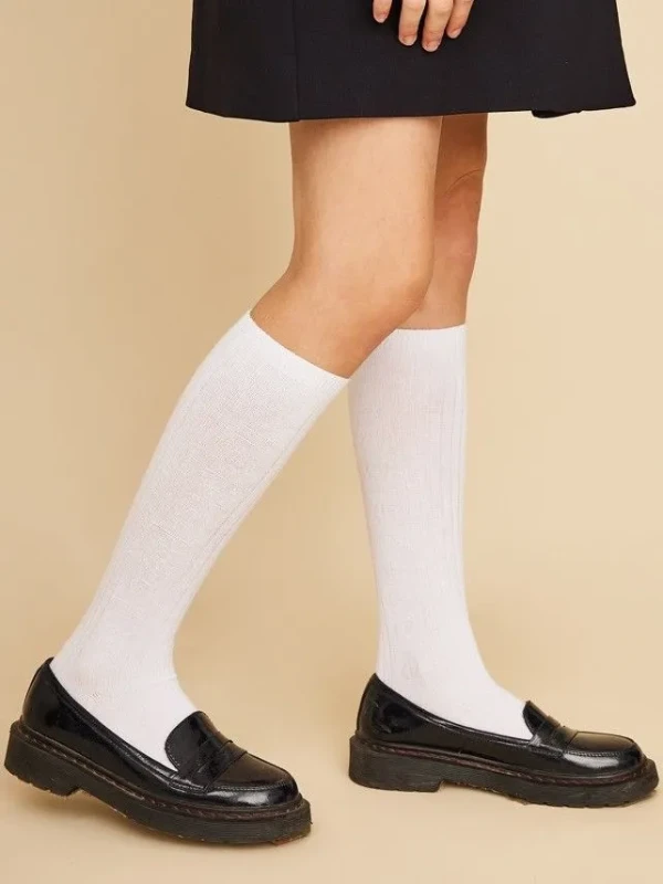 Теплый преппи: какие свитеры, жилеты и брюки выбрать ребенку в школу и не только