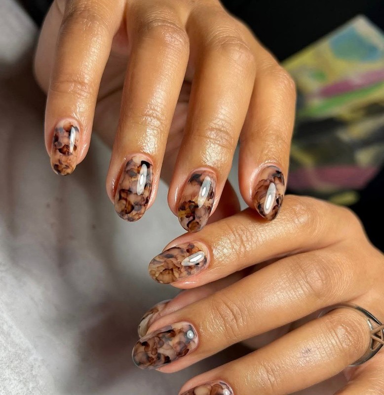 Фото: соцсети / @learnahstarbuck_nailartist